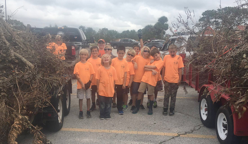 Pack 137 Cub Scouts Help out with Irma Debris