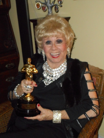 Sylvia Cox with award